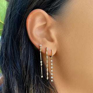 Dangling Diamond Spike Earrings.
